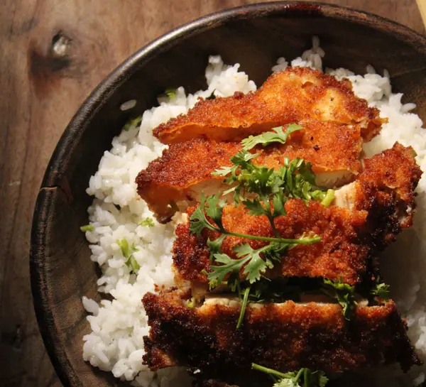 Crispy chicken with rice and carrot salad
